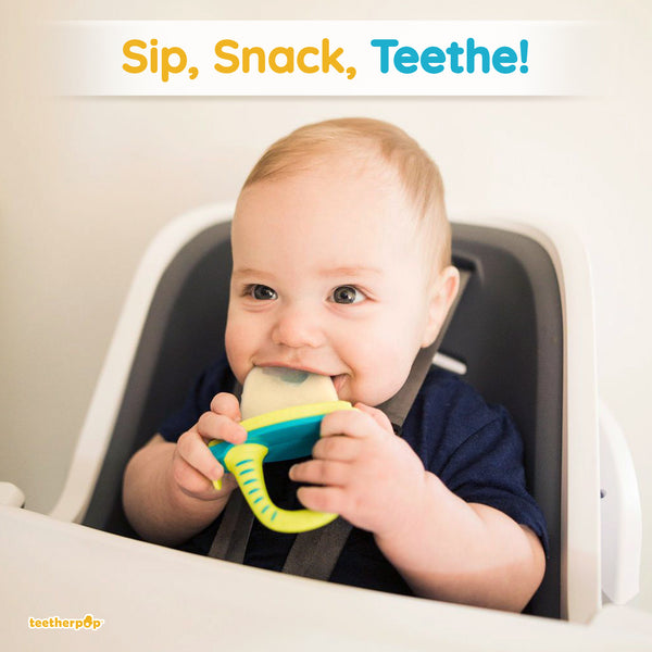 Baby holding Teetherpop™ enjoying a snack 